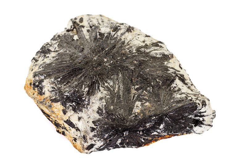 Raw aegirine crystal with black prismatic crystals on natural mineral matrix