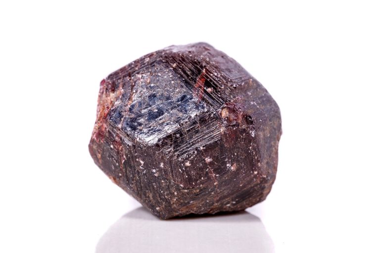 Raw Almandine Garnet Mineral Showing Natural Rough Deep Red Crystalline Texture