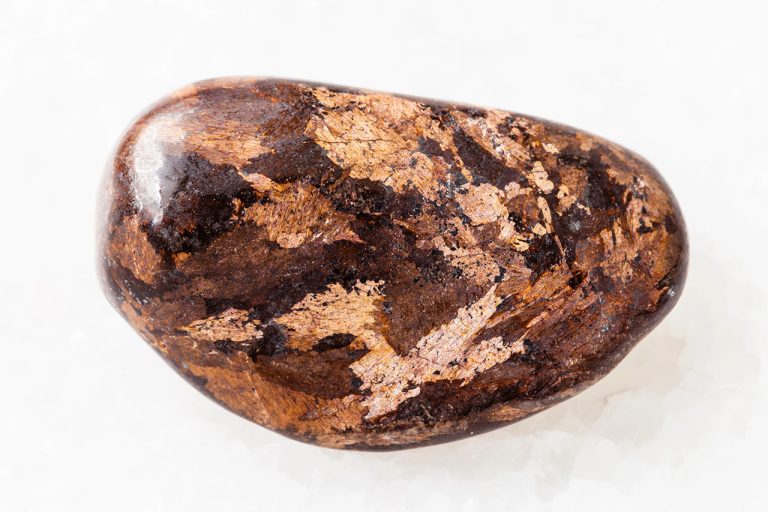 Polished bronzite stone with smooth glossy finish and bronze shimmering patterns