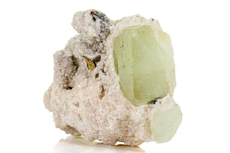 Raw Datolite Mineral Showing Natural Rough Crystalline Structure And Pale Green-White Tones