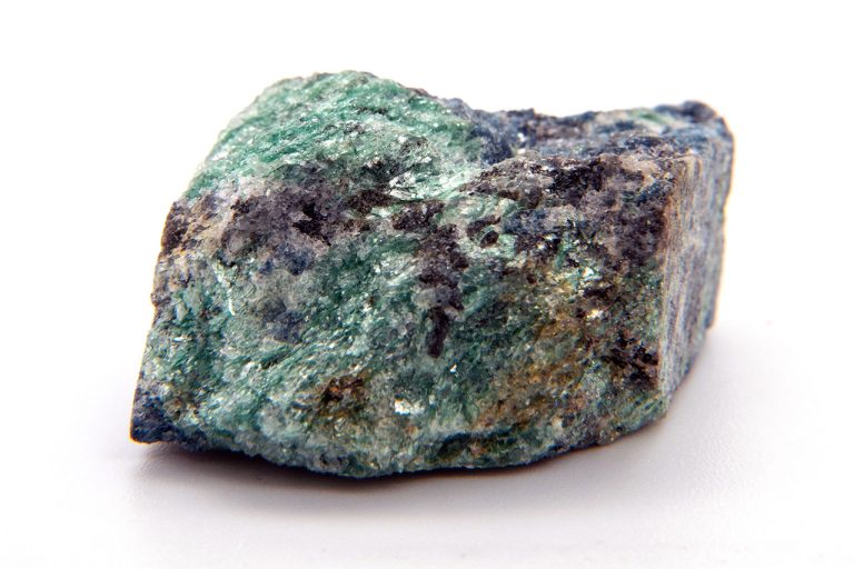 Raw Fuchsite Mineral Showing Natural Rough Texture With Vibrant Green Mica Layers