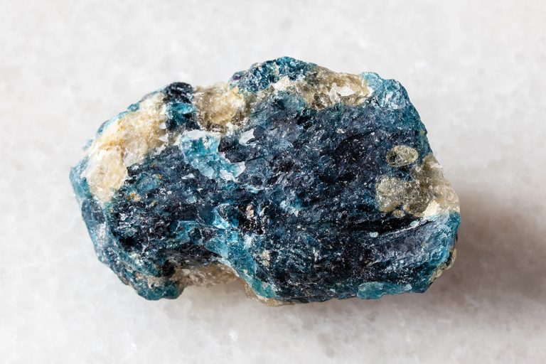 Raw Grandidierite Mineral Showing Natural Rough Crystal With Blue-Green Hues