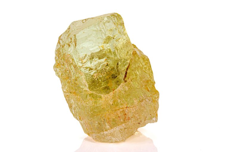 Raw Heliodor Mineral Showing Natural Rough Crystal With Pale Yellow To Green Hues