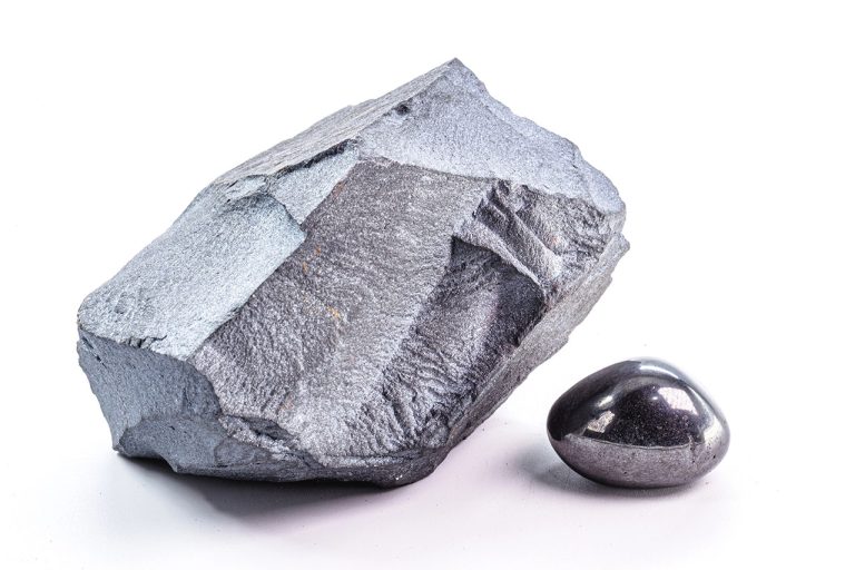 Tumbled And Raw Hematite Mineral Showing Natural Rough Metallic Gray-Black Texture
