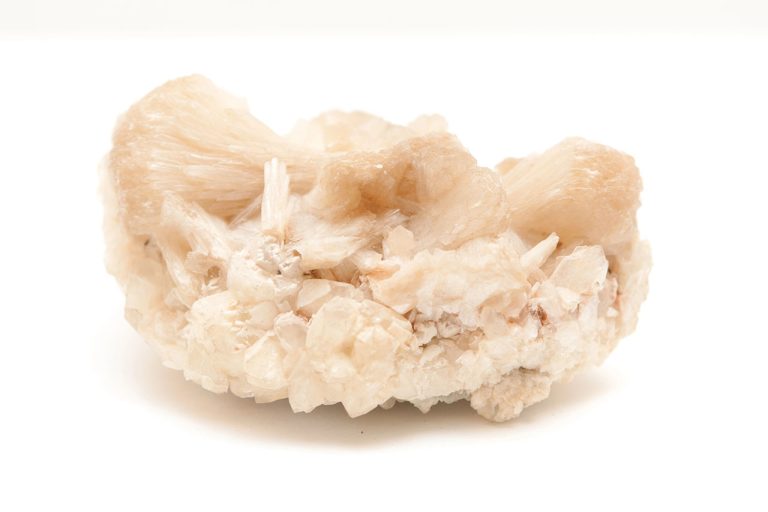 Raw Heulandite Mineral Showing Natural Rough Crystal Formation With Light Pink And Peach Tones
