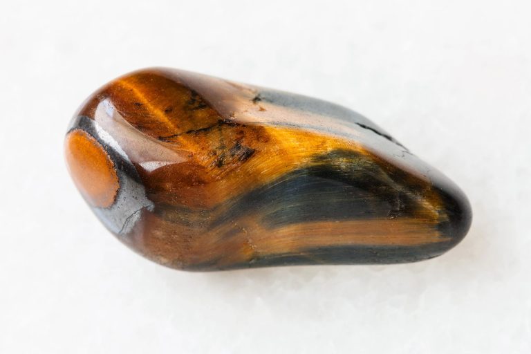 Tumbled Tiger’s Eye Crystal With Polished Golden-Brown Surface And Chatoyant Bands