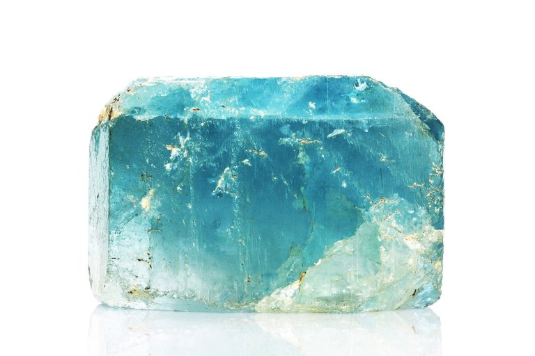 Raw Blue Topaz Mineral Showing Natural Rough Crystal Structure With Light Blue Hues