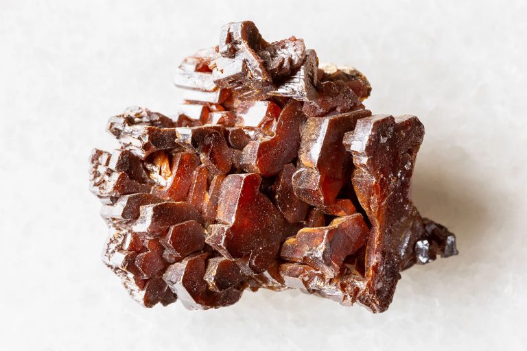 Raw Vanadinite Mineral Showing Natural Hexagonal Crystals With Vibrant Red-Orange Color